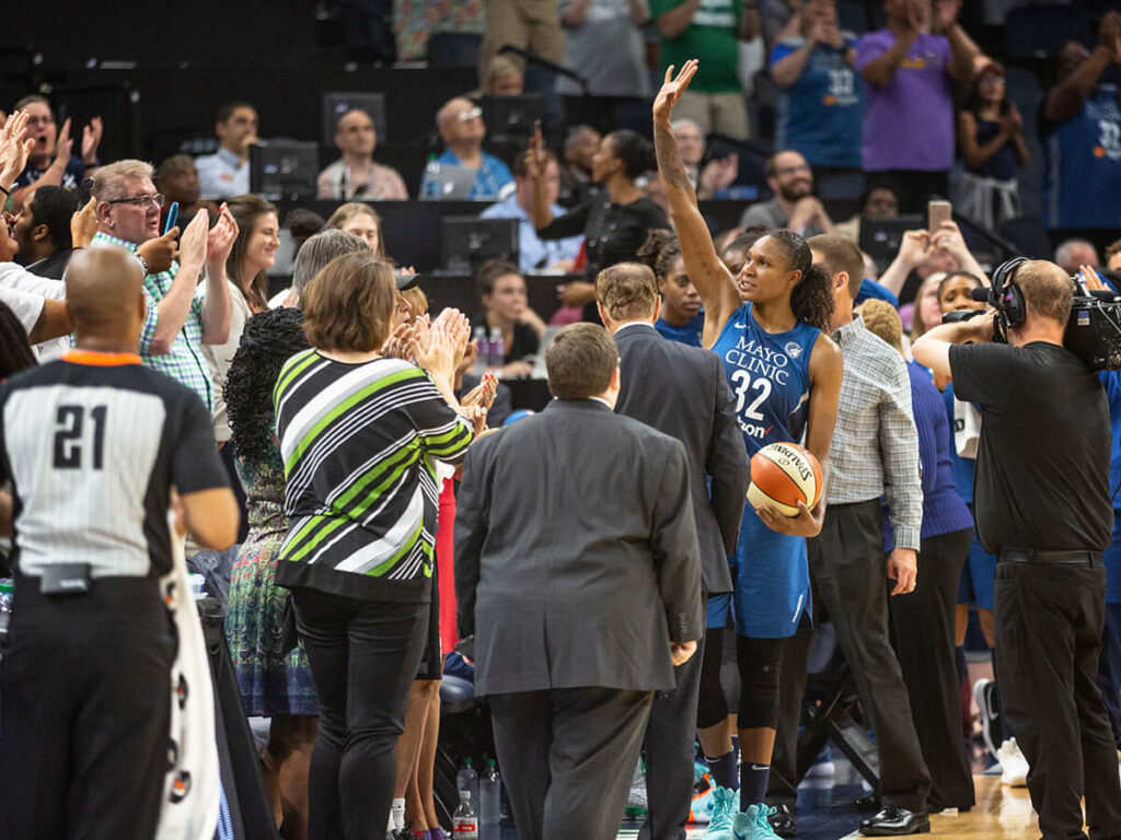 Rebekkah Brunson waves to the crowd after setting the all-time rebound record in 2018.