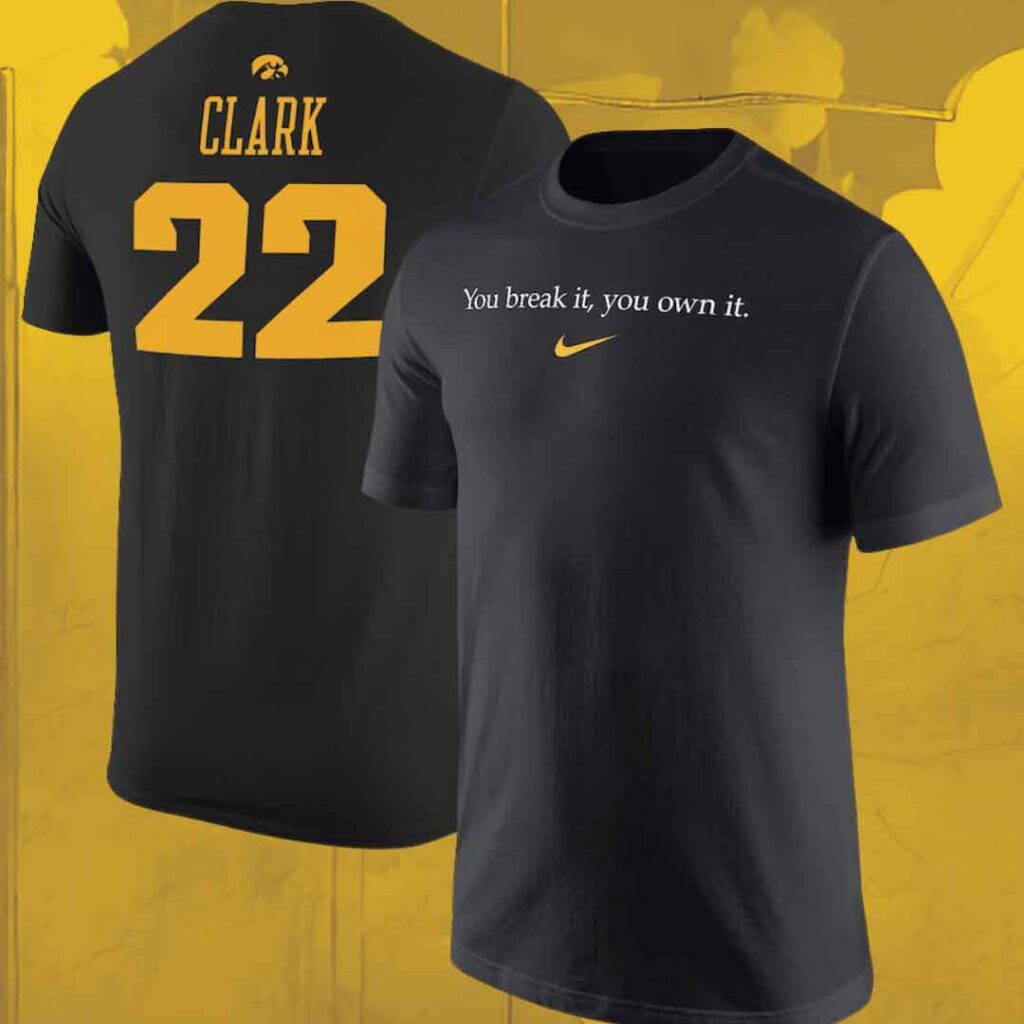 The Caitlin Clark Iowa Hawkeyes Nike “You Break It, You Own It” T-Shirt over a textured yellow background.