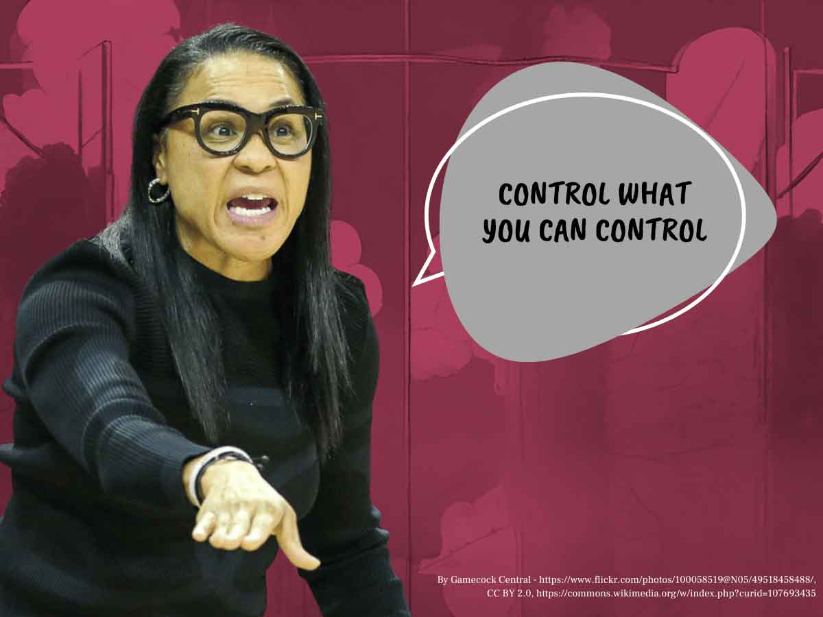A photo of Dawn Staley in a black sweater coaching in front of a red background. A quote bubble reads: Control What You Can Control