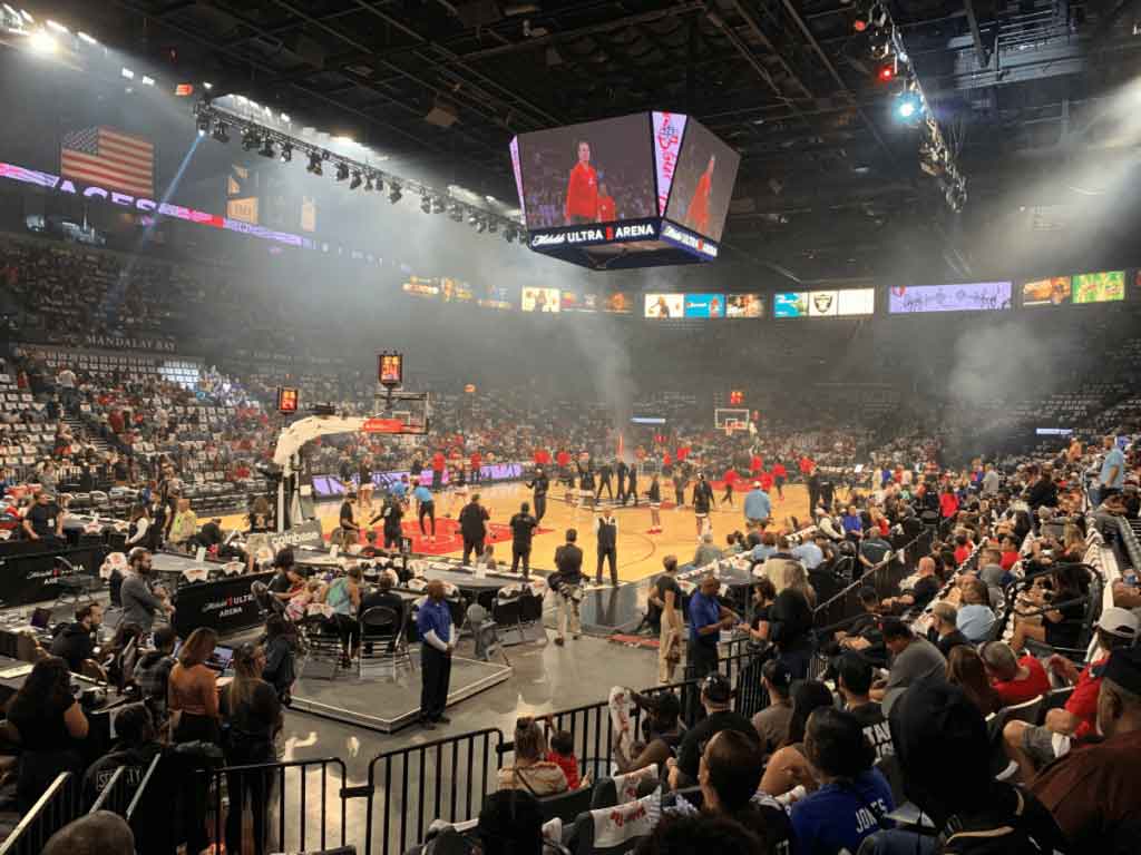 A photo of the Las Vegas Aces and Chicago Sky as they warm up before their WNBA game.